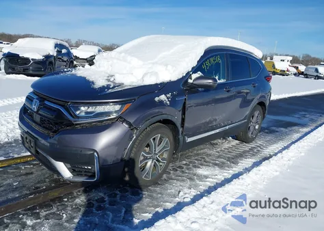 2020 Honda Cr-V Touring z USA, uszkodzony, nr VIN 7FART6H97LE002018